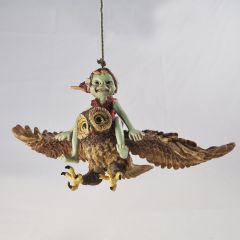 pixie riding an owl 